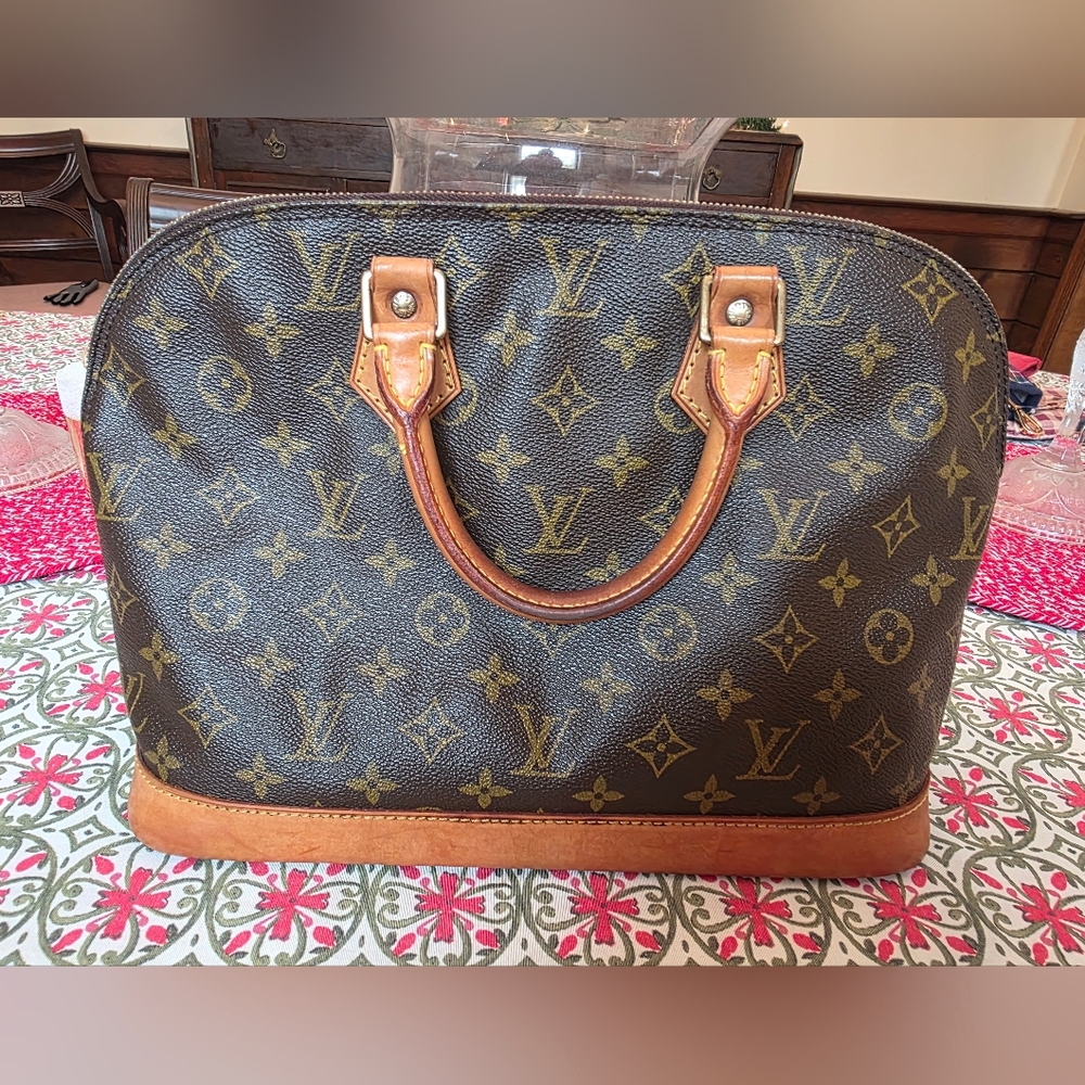 Well Loved Louis Vuitton Alma PM